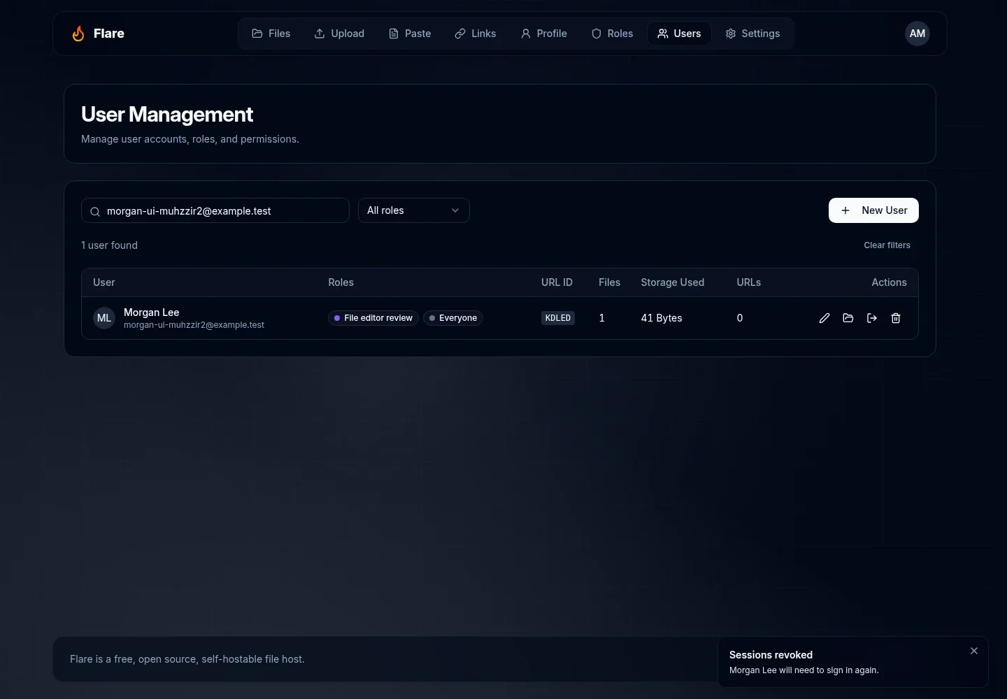 Users list with a Sessions revoked notification saying Morgan Lee will need to sign in again